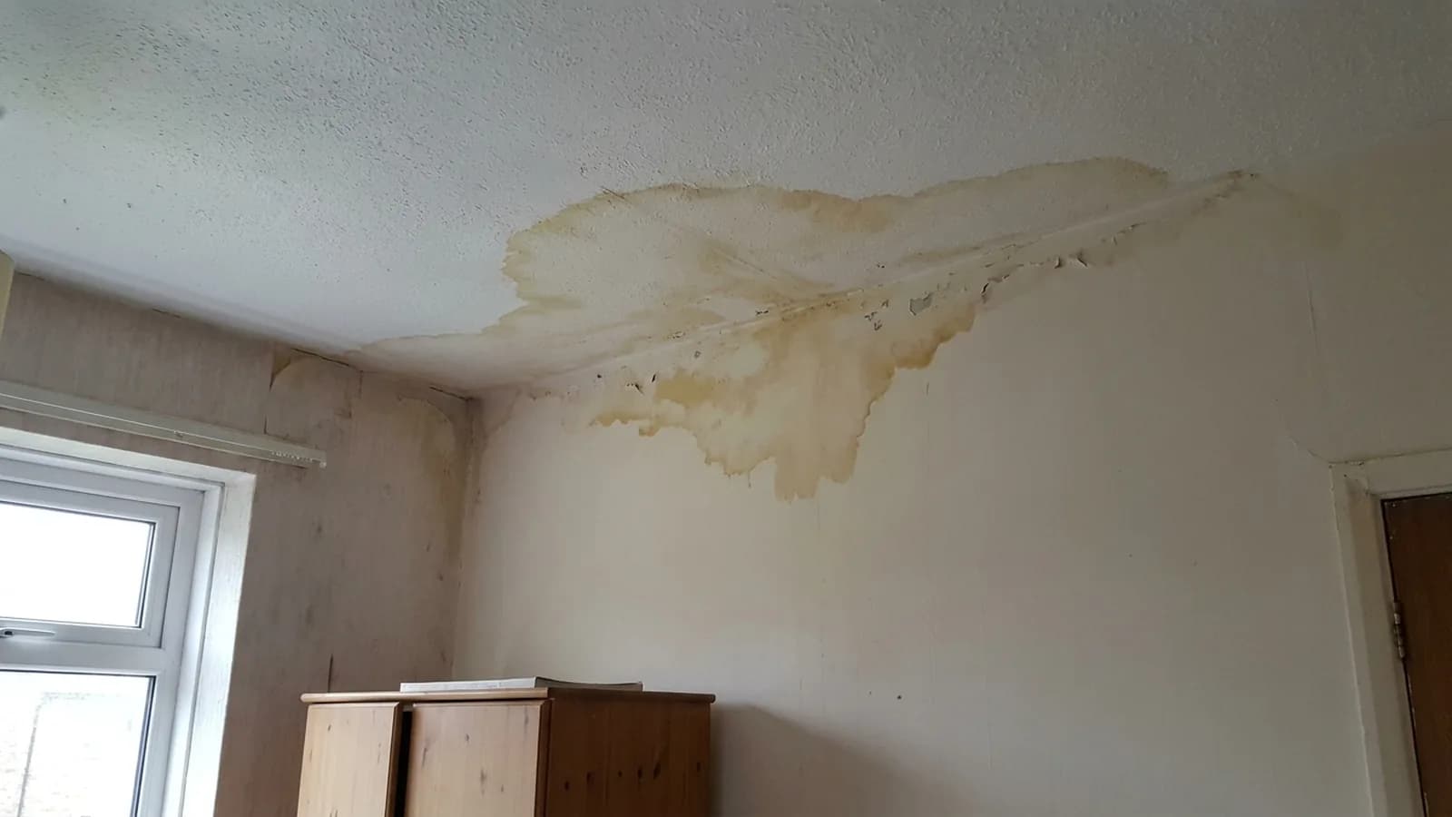 A ceiling stain that appears long after rain