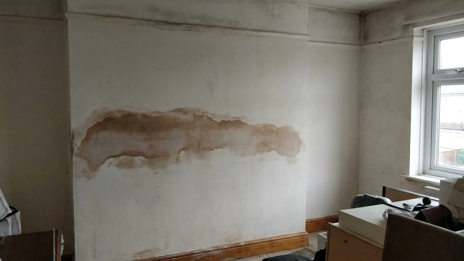 A damp patch on a chimney breast