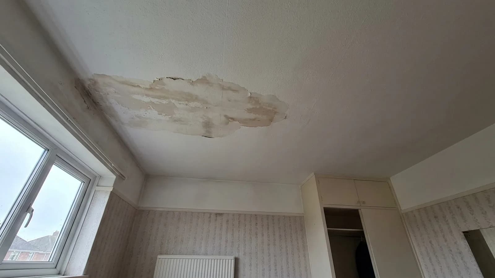 A damp patch on an upstairs ceiling