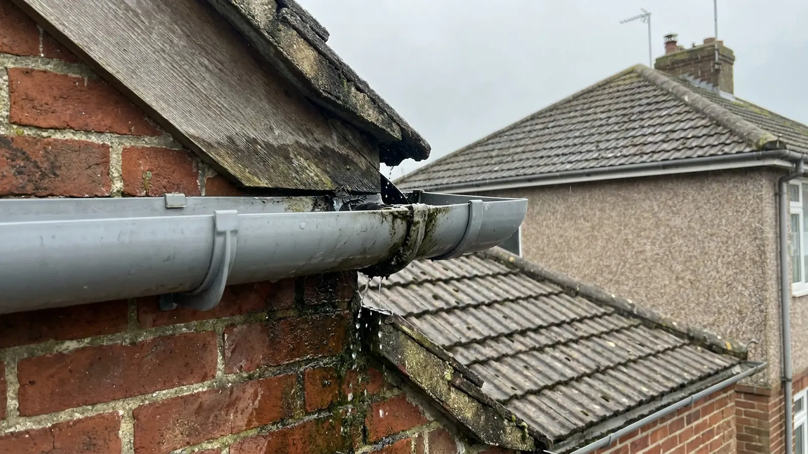 A gutter overflowing at a joint