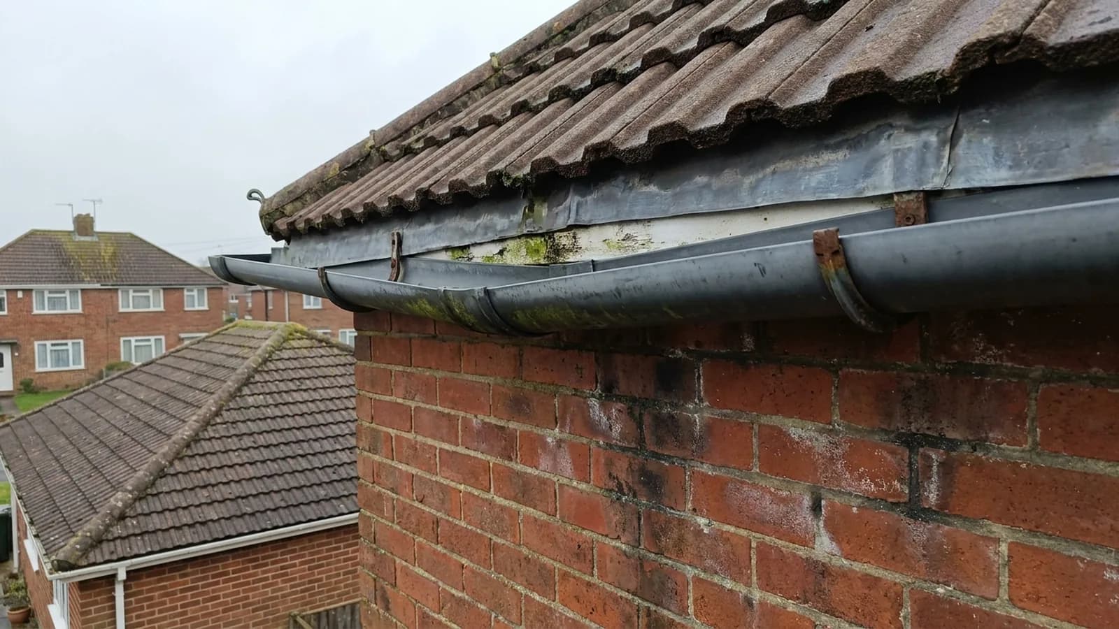 A gutter sagging between brackets