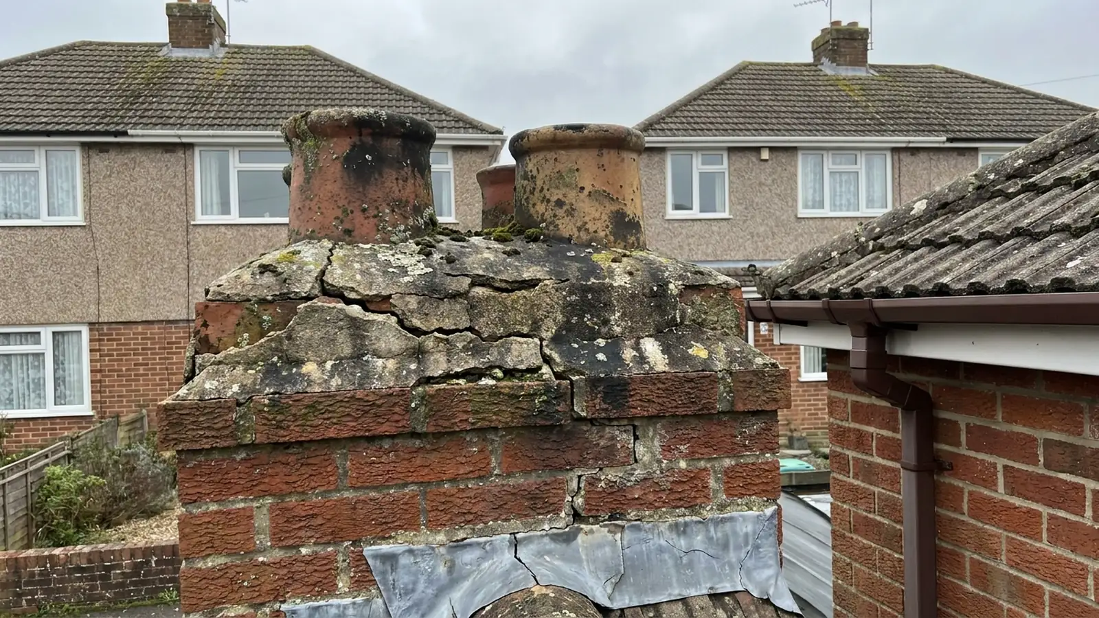 Cracked flaunching around chimney pots