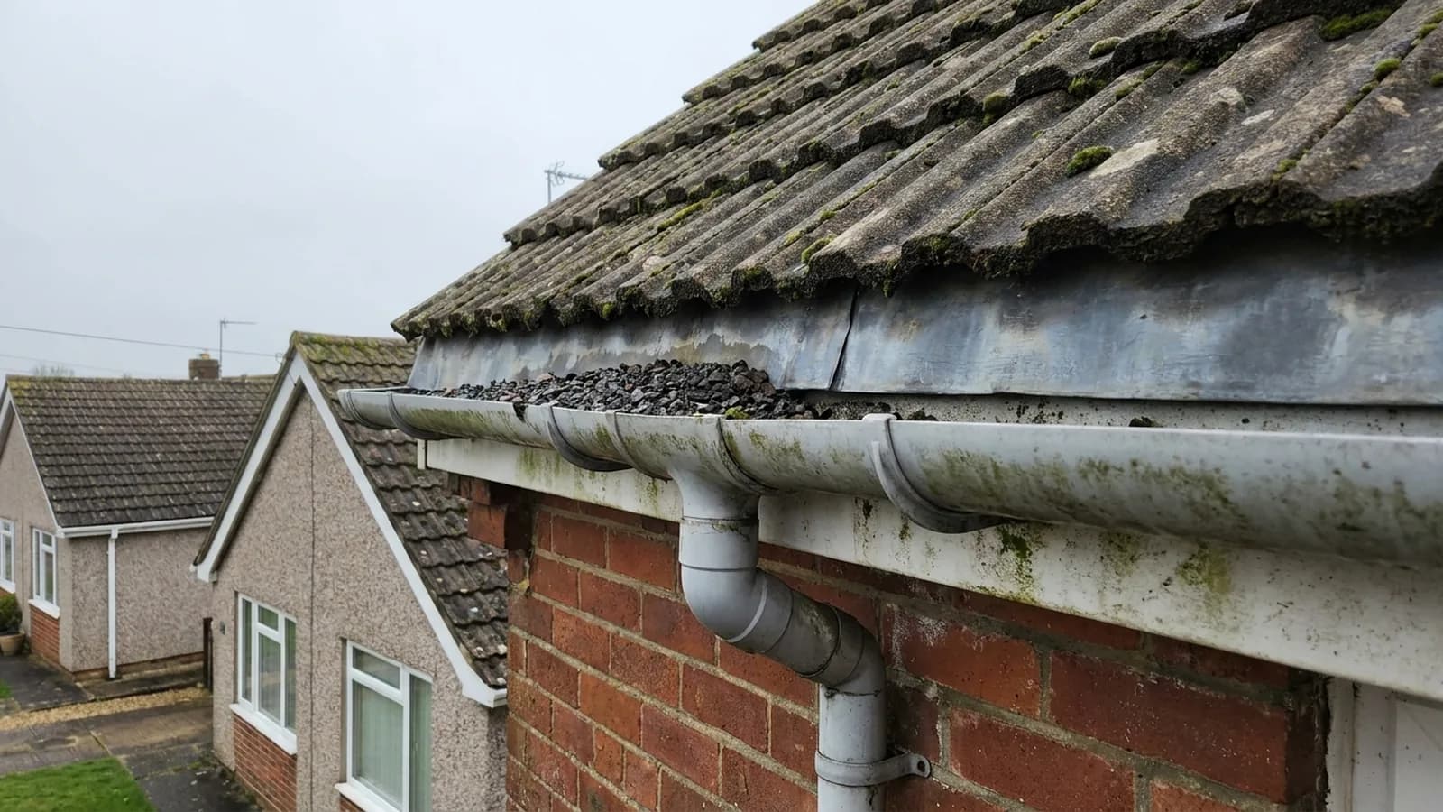 Mineral chippings washed into a gutter