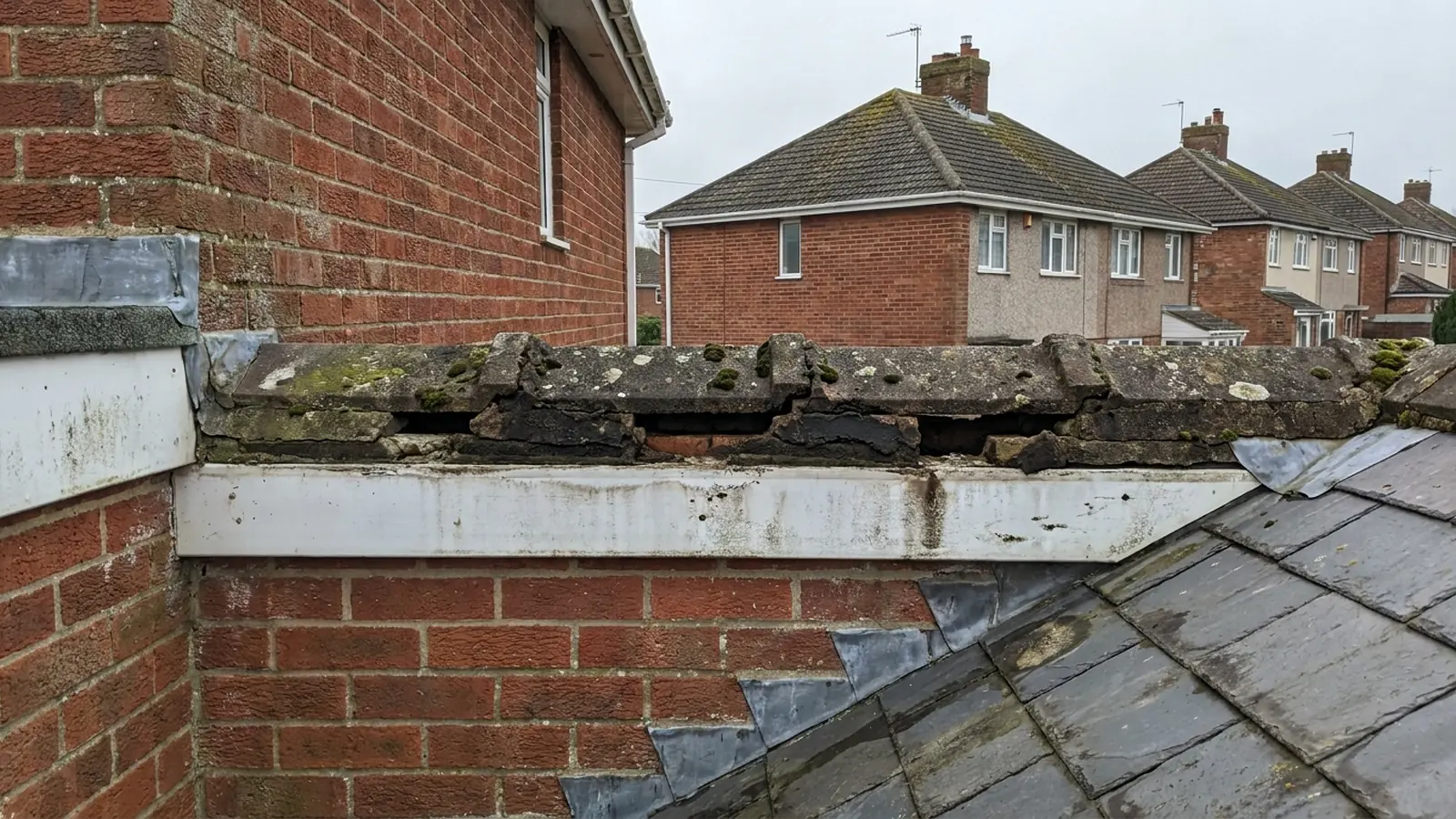 Ridge line with visible gaps in the mortar