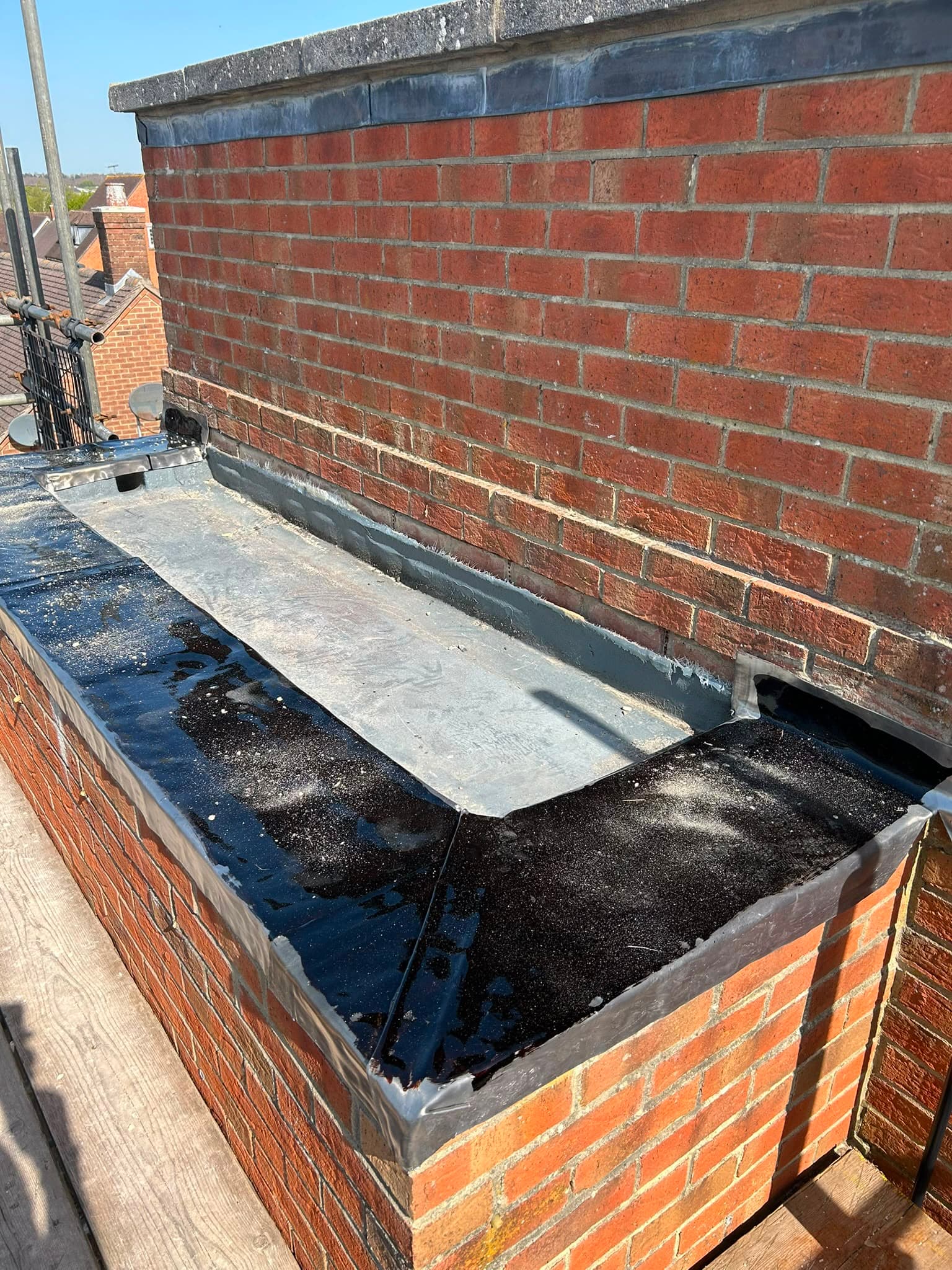 Torch-on felt flat roof